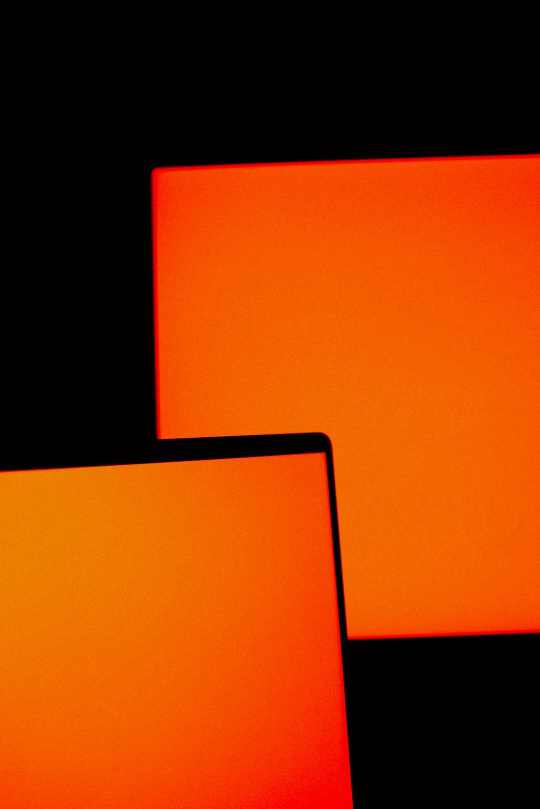 Close-up of a laptop screen showing colorful programming code