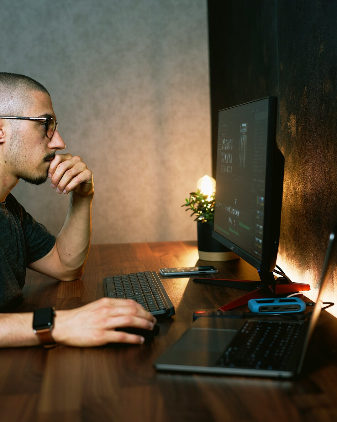 young programmer working on laptop